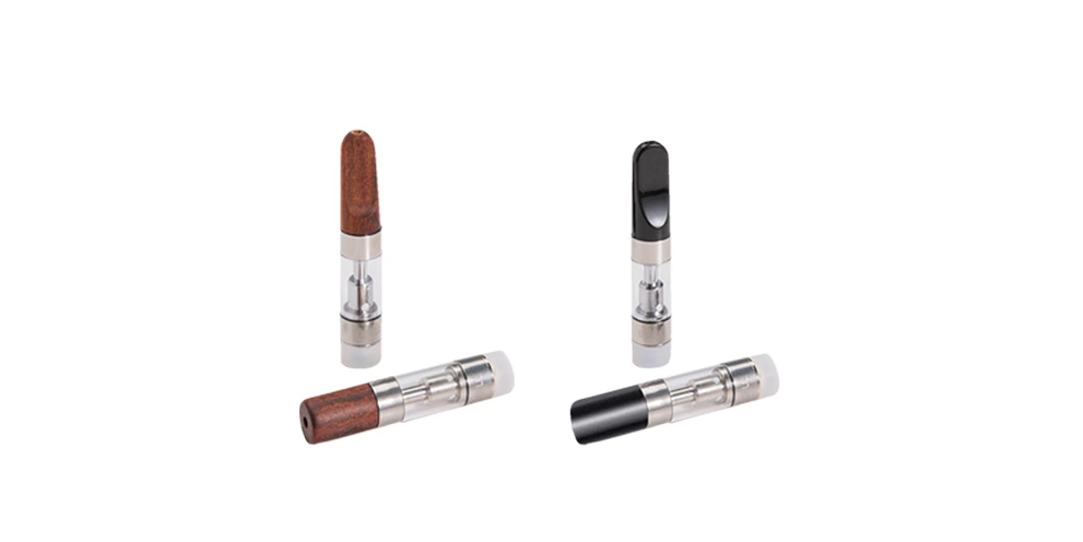 CCELL M6T oil cartridges with black and brown mouth pieces.